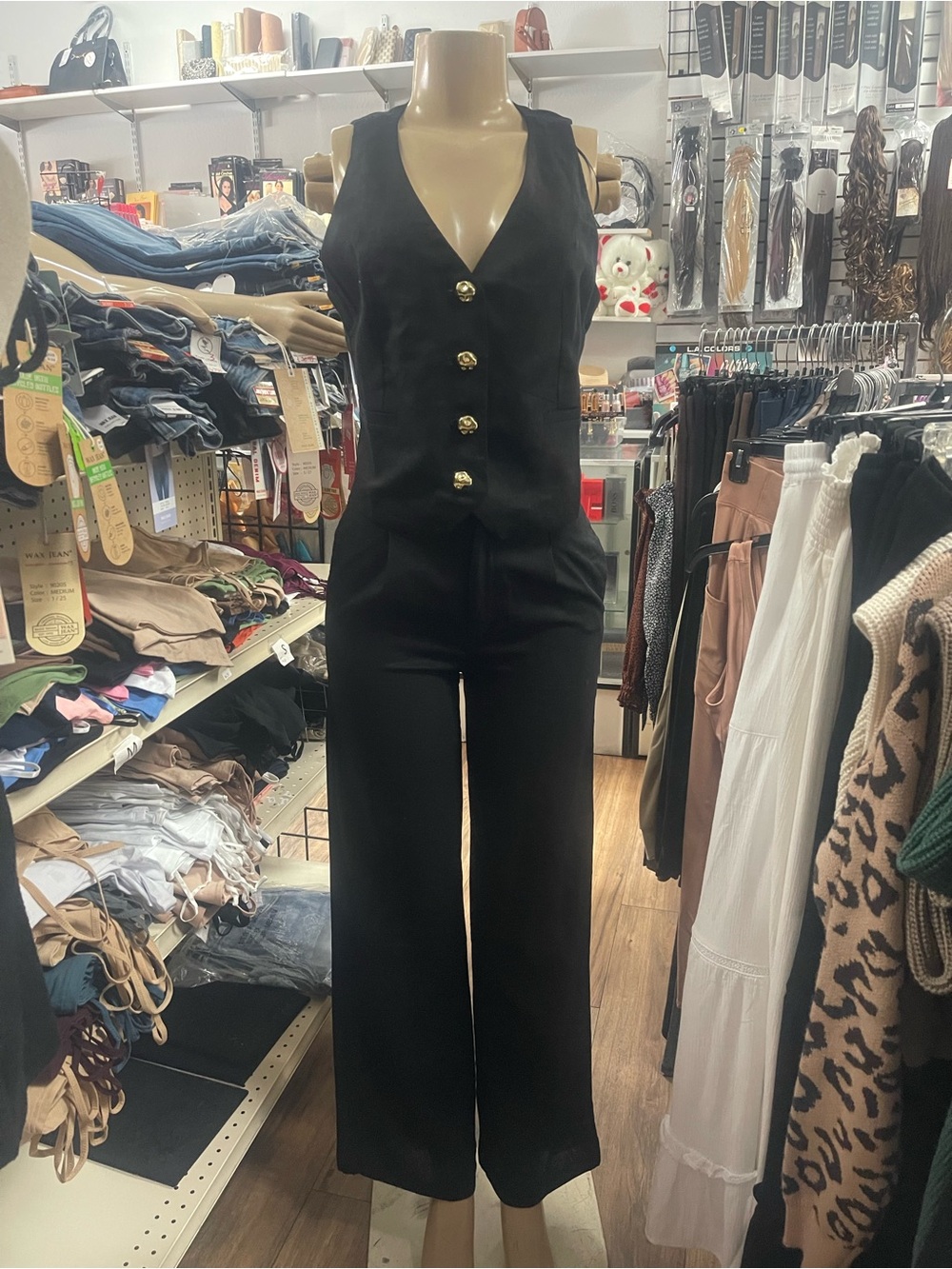 Women’s Black Sleeveless Jumpsuit with Gold Buttons